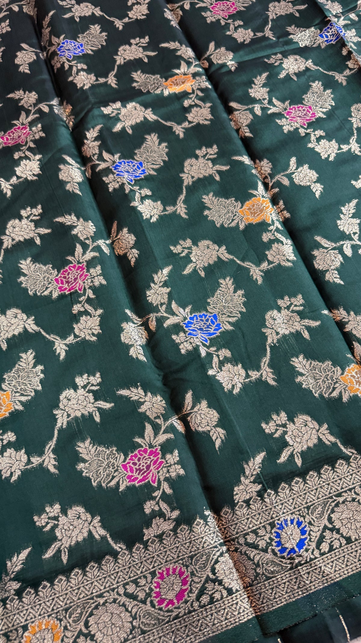 Dark Green Georgette Silk Saree with Floral Zari Weaving