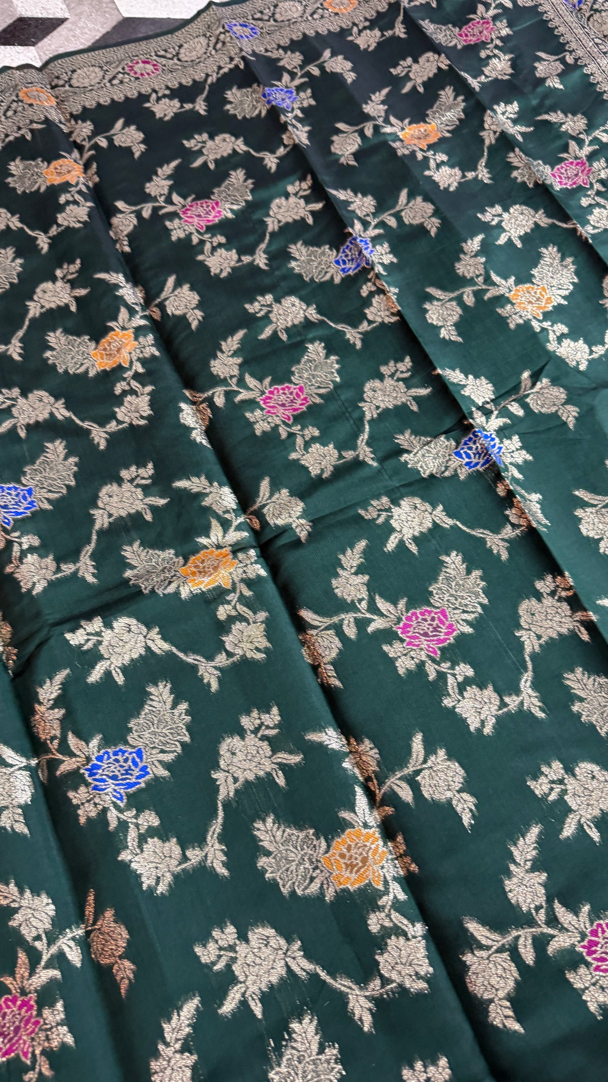 Dark Green Georgette Silk Saree with Floral Zari Weaving